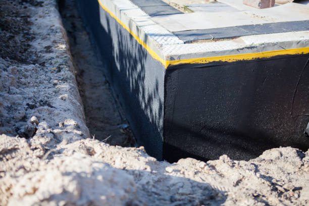 Professional Exterior Waterproofing technician working in Peachtree City, GA